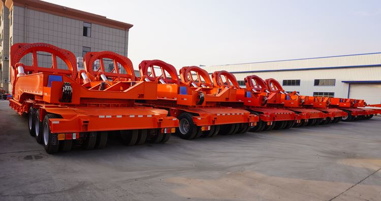 The windmill blade trailer changes its direction to avoid the turbine blade being hit in tough terrain